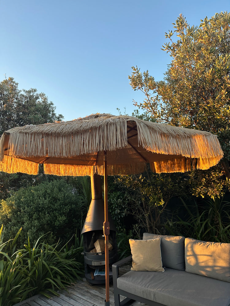 Hula 275cm MARKET Umbrella with crank lift - Raffia ThatchBring the charm and the lifestyle of the islands to your home or business with this hula shade umbrella. This nine-foot (275cm) raffia thatch umbrella is the perfectBeachkit