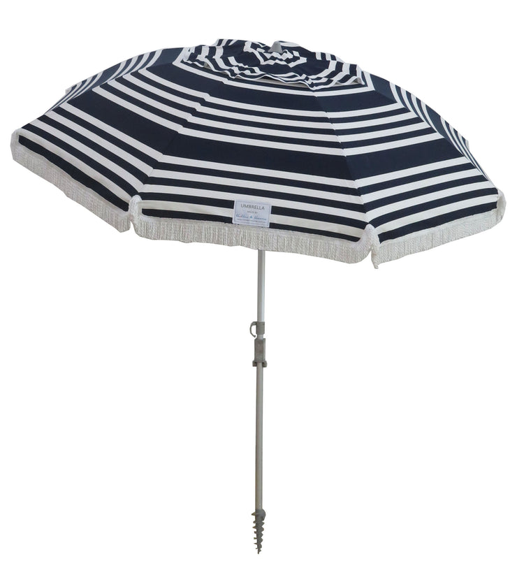 Hollie & Harrie Classic Fringe 210cm Canvas Beach Umbrella - Hello SaiWow the Hello Sailor is a Classic.
The Fringe 210cm Beach Umbrella is a classic beach lovers staple. The thick & luxurious 100% cotton canopy with a retro fringBeachkit