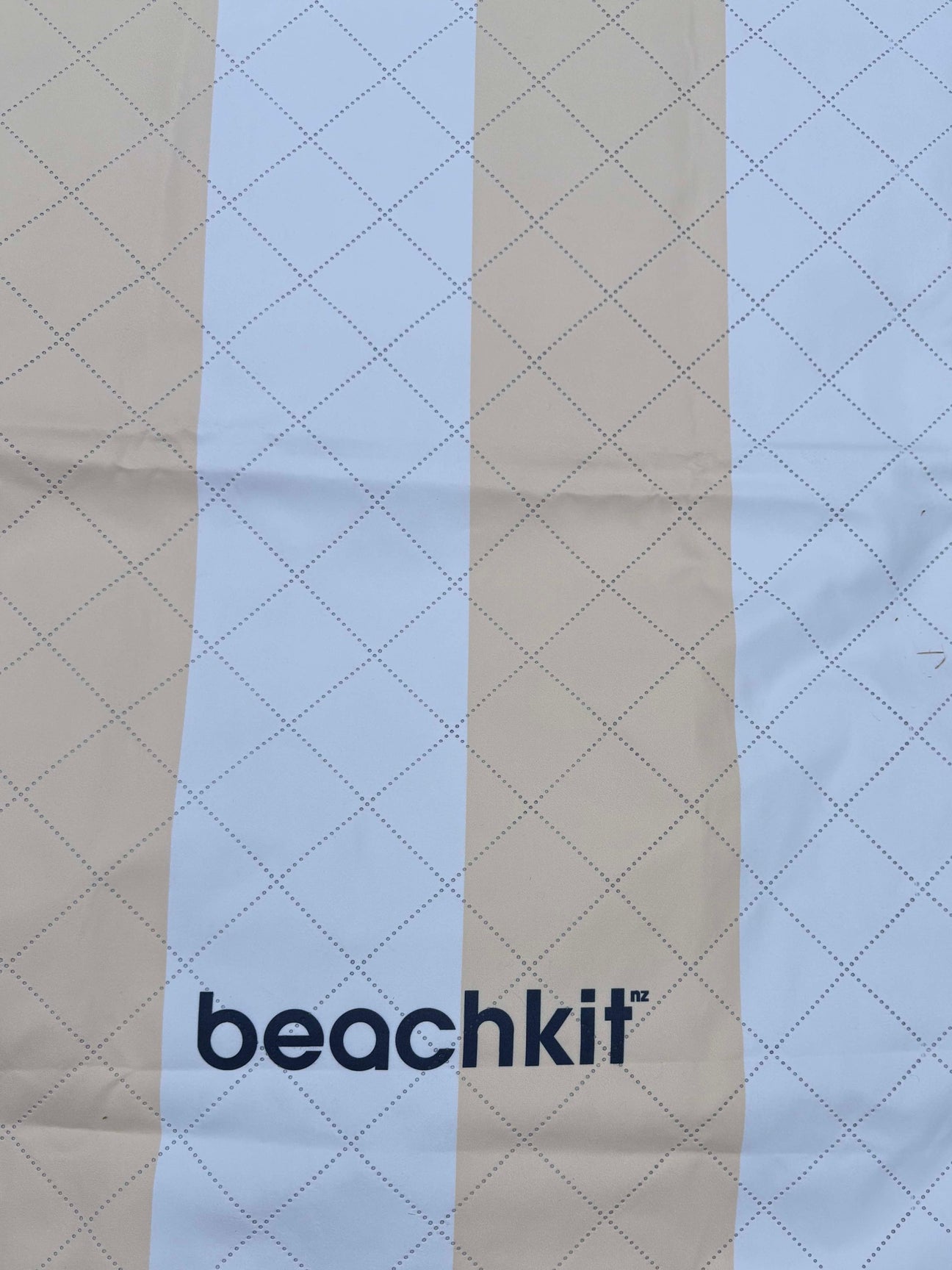 Beige striped beachmat